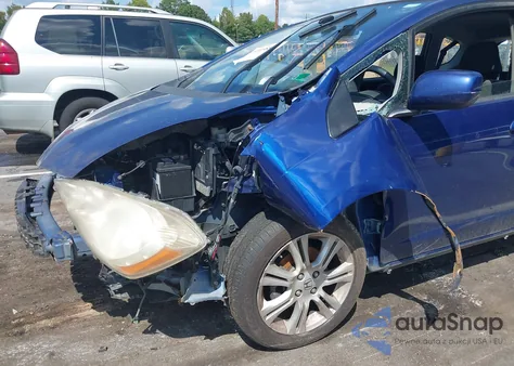 2009 Honda Fit Sport from USA, damaged, VIN JHMGE884X9C007022